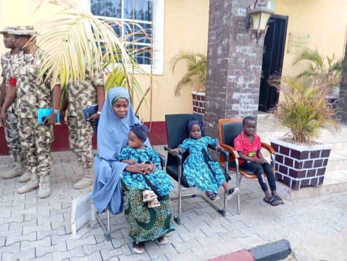 Latest arrival: Lydia Simon, 26, appearing at press event in Maiduguri after spending 10 years in Boko Haram servitude. Credit Mike James