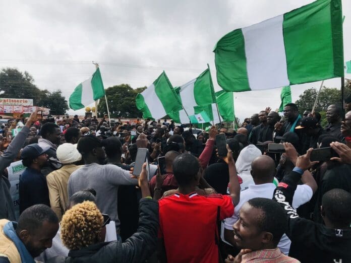 Simultaneously, thousands of civilians gathered in major cities across the country in the second-largest demonstration in four years against what organizers labeled as “bad governance” under President Bola Tinubu's administration. Credit: Masara Kim.