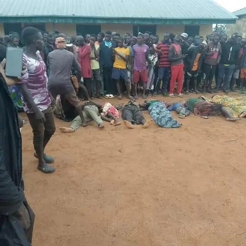 Villagers weeping in front of the dead bodies, Credit Sunday Aboh.