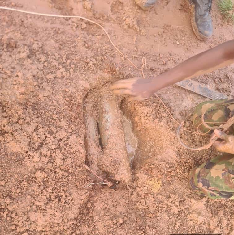 A Nigerian soldier disposes of an improvised explosive device planted by terrorists in Bukkuyyum, Zamfara State. Photo credit: Facebook/HQ Nigerian Army.