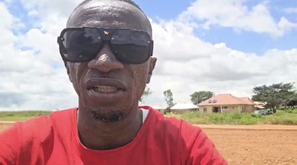 Dalyop Solomon speaks in a selfie video shot from the scene of an attack while bullets were still flying